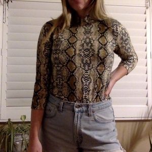 High neck snake print top size M/L.